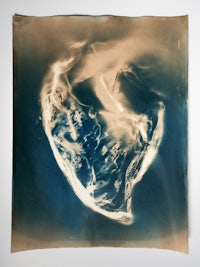a photo of a heart with smoke coming out of it