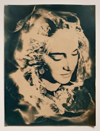 a black and white photo of a woman's face