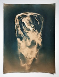a photo of a glass of water on a table
